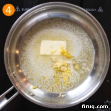 Ultimate Air Fryer Parmesan Chicken 7 Simmering garlic in butter with lemon zest.