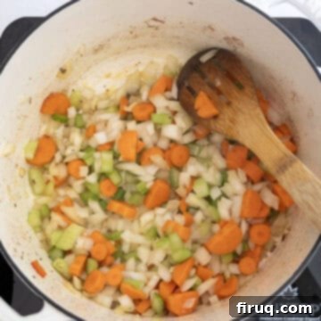 Golden Harvest Chili 5 Sauteing the celery, onions, and carrots in a dutch oven to create an aromatic base.
