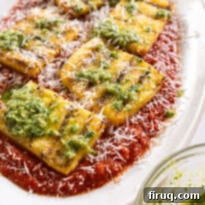 Golden Grilled Polenta with Marinara and Pesto 12 Grilled polenta on marinara topped with pesto and parmigiano.