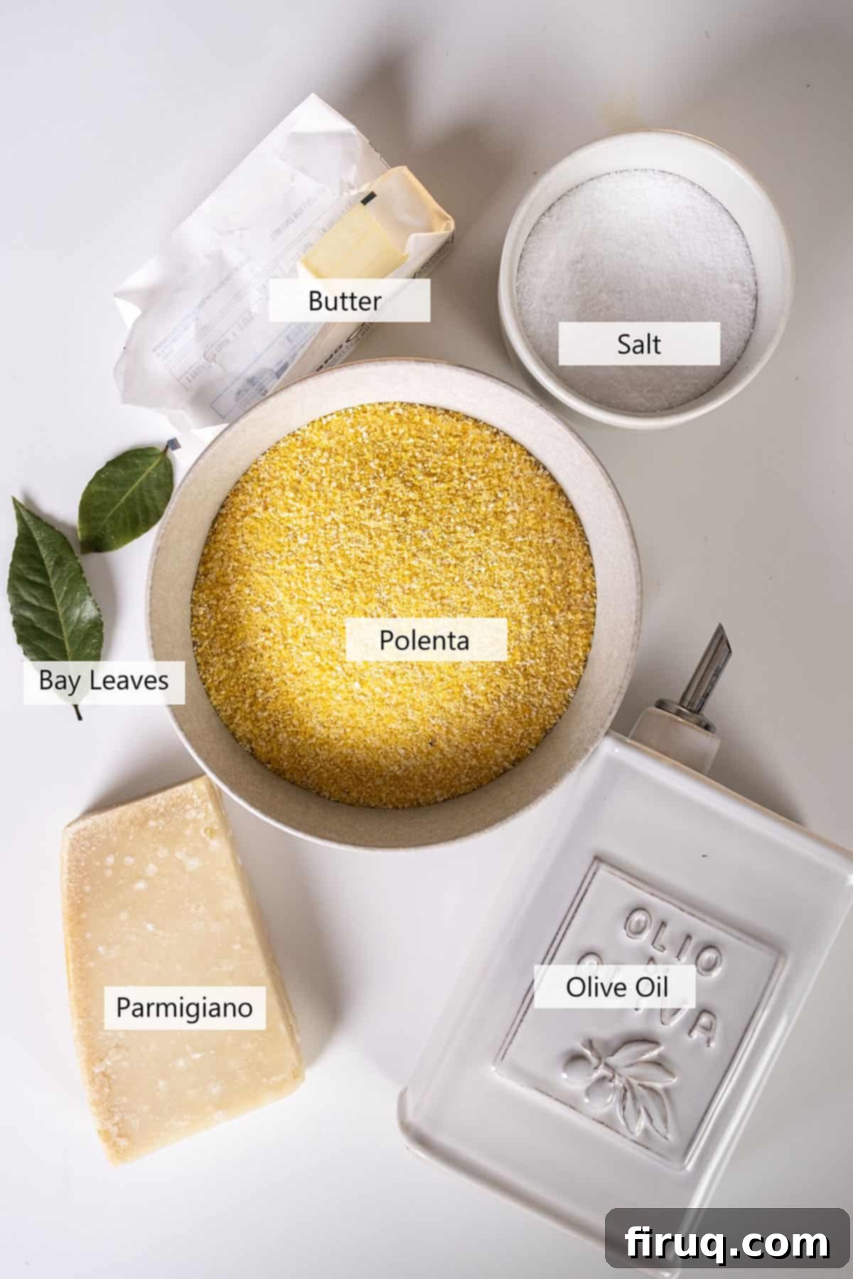 Golden Grilled Polenta with Marinara and Pesto 3 Fresh ingredients for creamy polenta and grilled polenta recipe, including medium grit cornmeal, Parmigiano cheese, olive oil, and bay leaves.