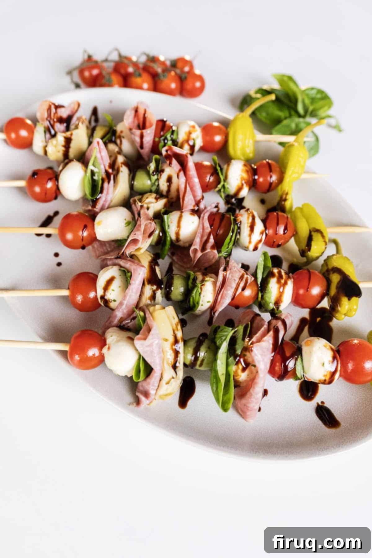Mini Caprese Bites 6 A large platter filled with dozens of Caprese skewers, ready for a party.