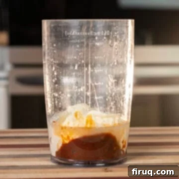 Zesty Bang Bang Chicken Skewers 4 Chipotle mayo ingredients combined in a mixing cup before blending.