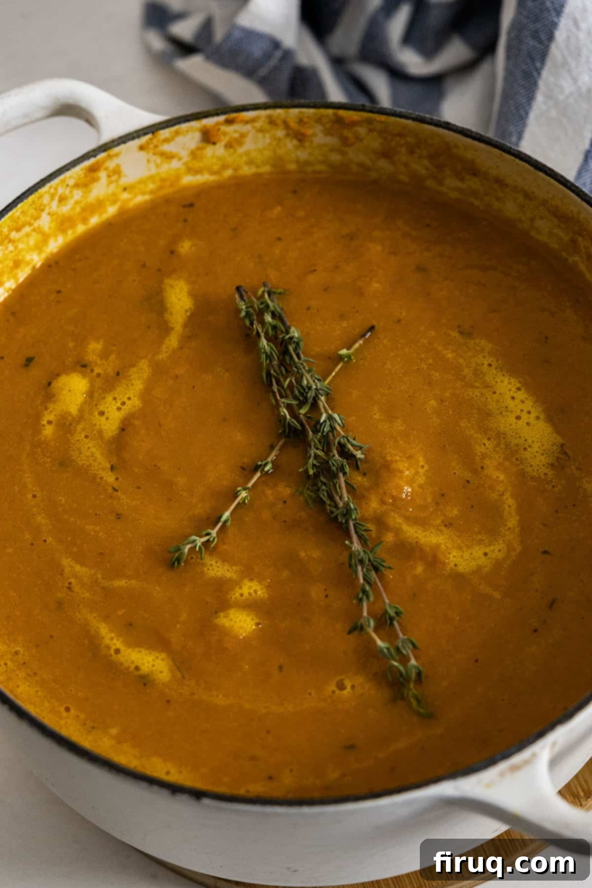 Velvety Roasted Carrot Ginger Soup 9 roasted carrot ginger soup topped with thyme