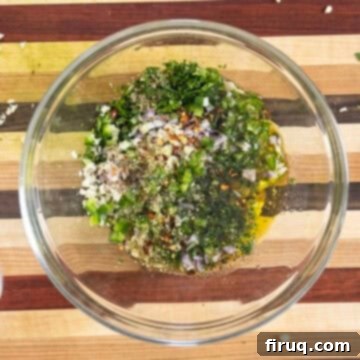 Vibrant Chimichurri Steak Tacos 7 Parsley, shallots, jalapeno, and garlic with added seasonings and olive oil.