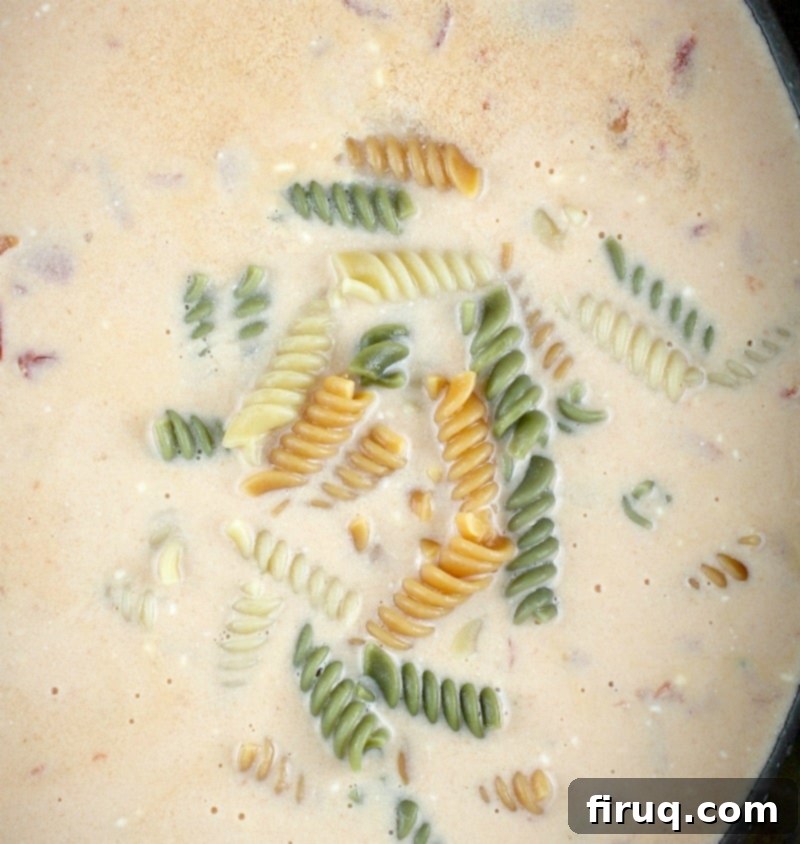 Yuletide Comfort Bowl 8 top down view of the slow cooker soup showing the pasta added