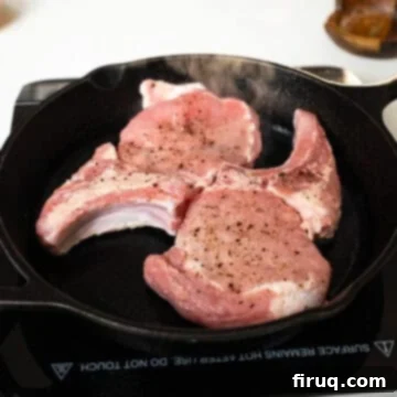 Pork Chops with Bourbon Peach Glaze 8 Searing pork chops in a cast iron.