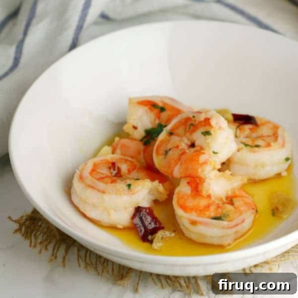 Mediterranean Garlic Shrimp Dish Garlic shrimp in a white bowl, ready to be served