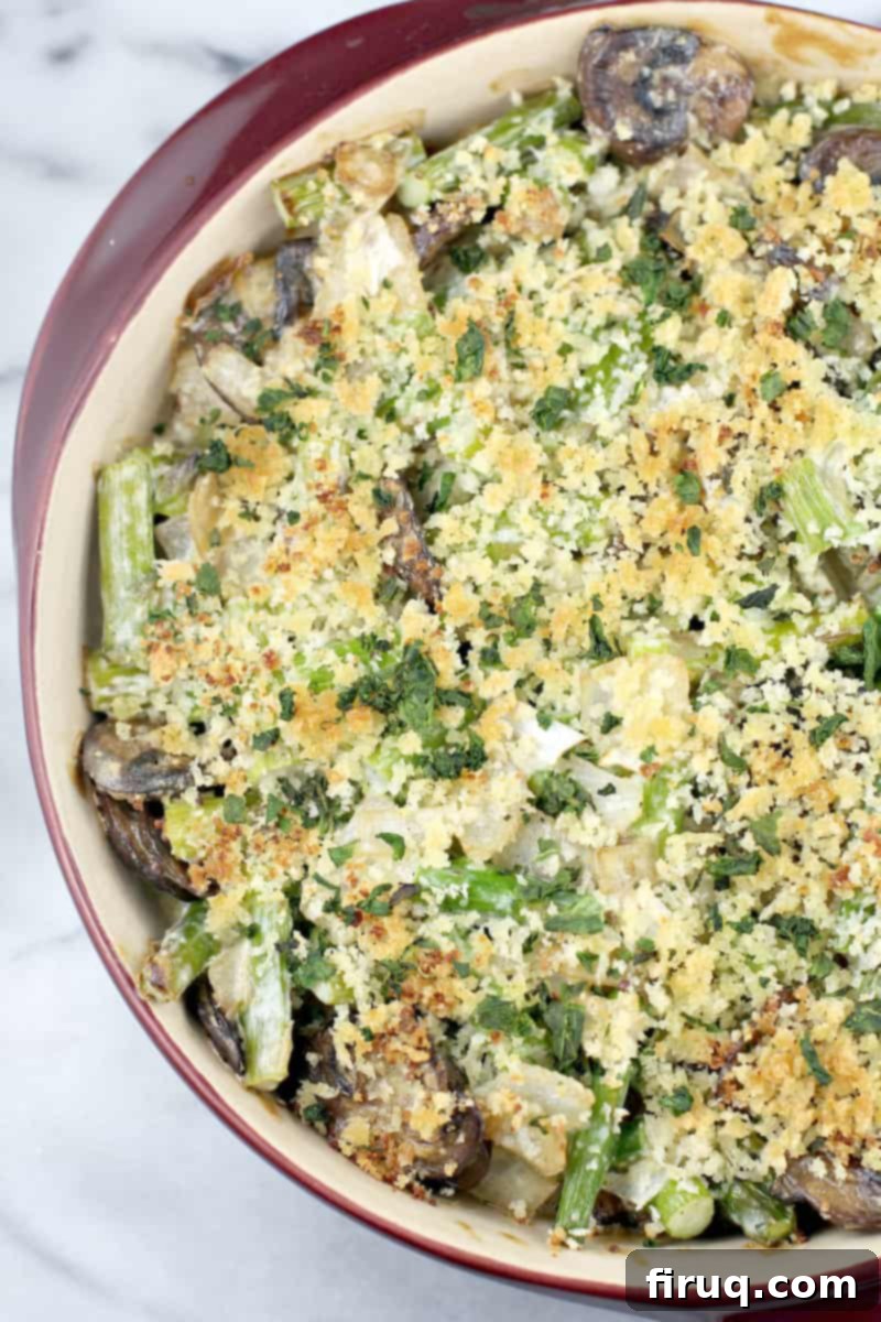 Creamy Asparagus Bake 11 Top-down view of the freshly baked Asparagus Casserole, showcasing its golden-brown topping and creamy interior.