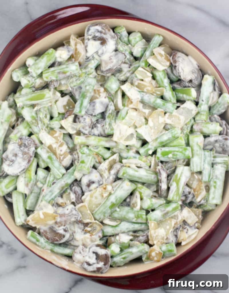 Creamy Asparagus Bake 8 Assembled Asparagus Casserole in a baking dish, prior to adding the crispy topping and baking.