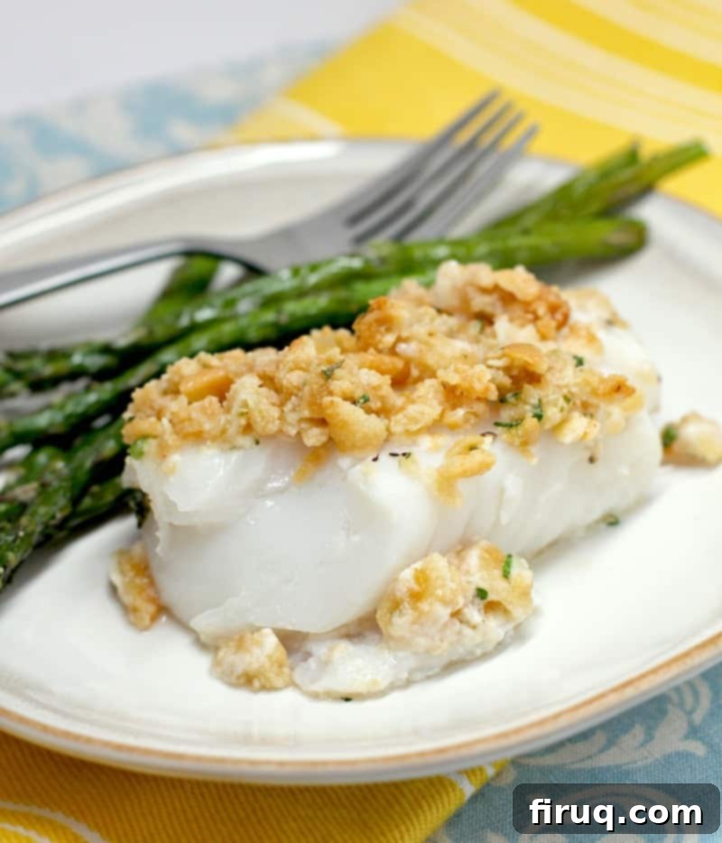 Classic Boston Baked Cod 2 plated cod dinner with asparagus
