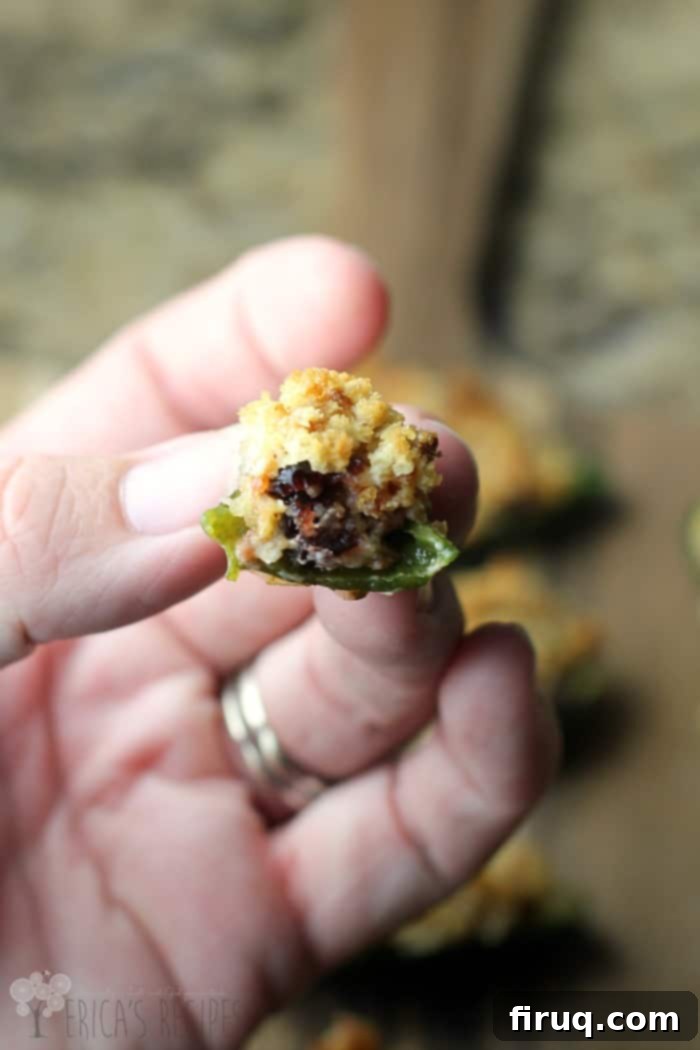 Sweet and Spicy Cranberry Chorizo Poppers 4 Assortment of festive Cranberry Chorizo Jalapeno Poppers on a serving platter.
