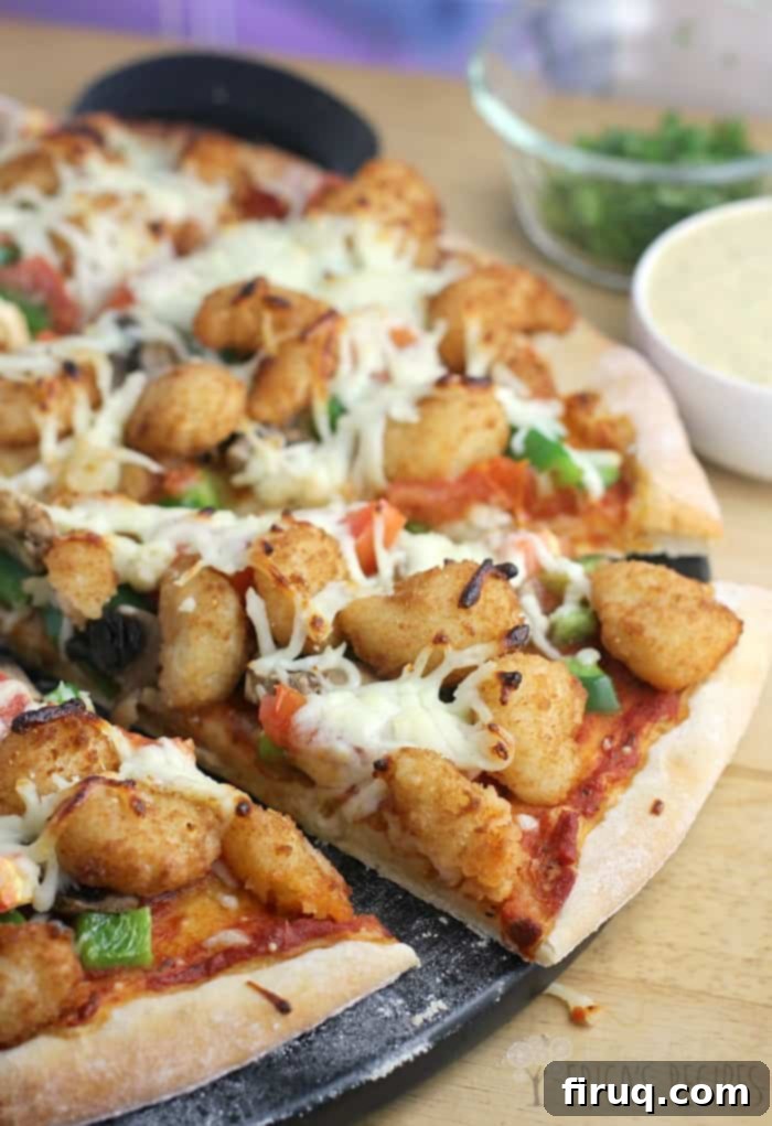 Cajun Shrimp Pizza 3 Uncooked shrimp and cheese on pizza before baking