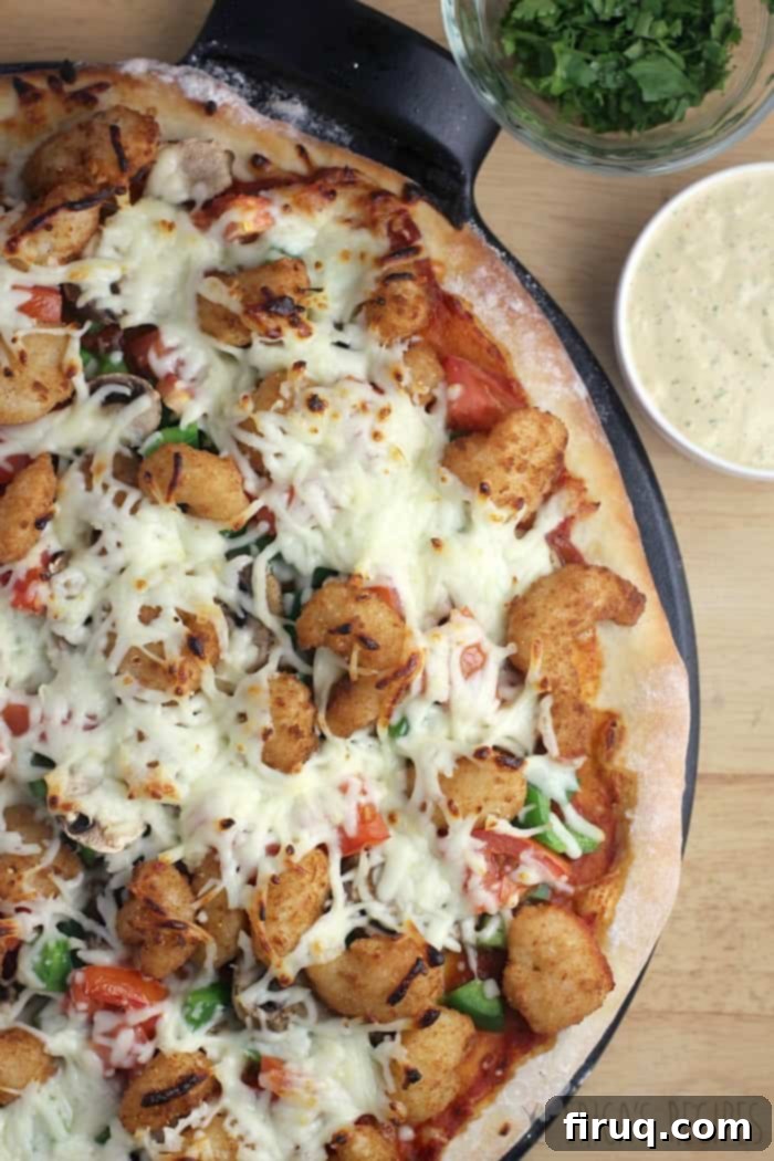 Cajun Shrimp Pizza 4 Shrimp Po' Boy Pizza slices topped with creamy remoulade