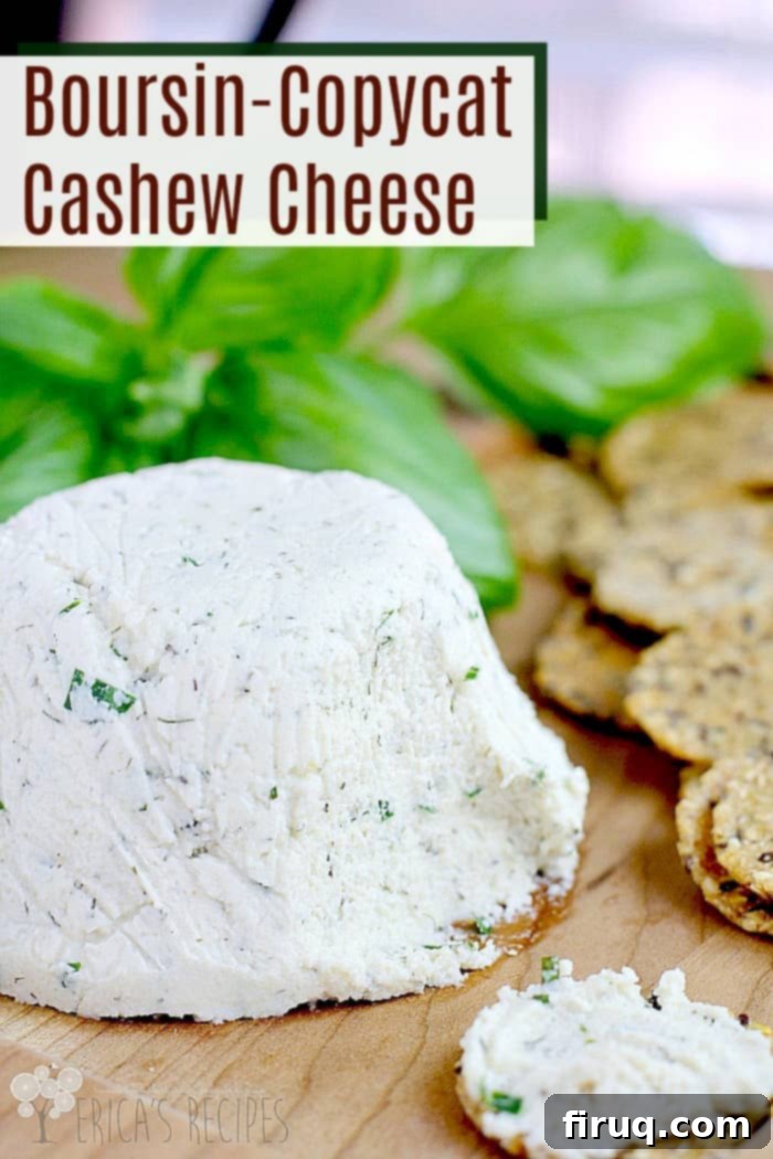 Boursin Style Herbed Cashew Cheese 3 Boursin-Copycat Cashew Cheese, elegantly spread on crackers, garnished with fresh herbs, and surrounded by fresh vegetables. A perfect centerpiece for a vegan party spread.