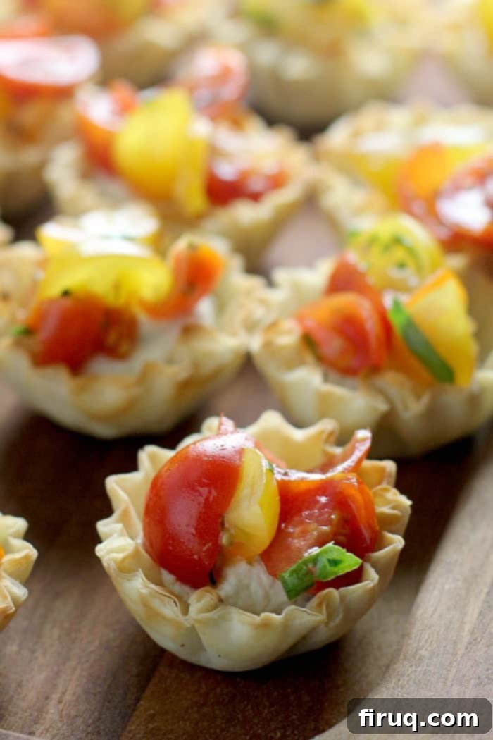 Creamy Dijon Cashew Bruschetta Bites 2 Mini Bruschetta Tarts with Dijon Cashew Cream, a perfect vegan appetizer for any party.