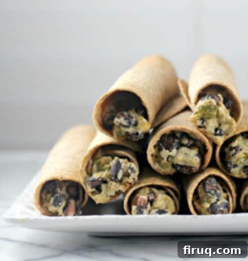 Vegan Kara Fasulye Taquitos 3 Dairy-Free Black Bean Taquitos on a serving platter