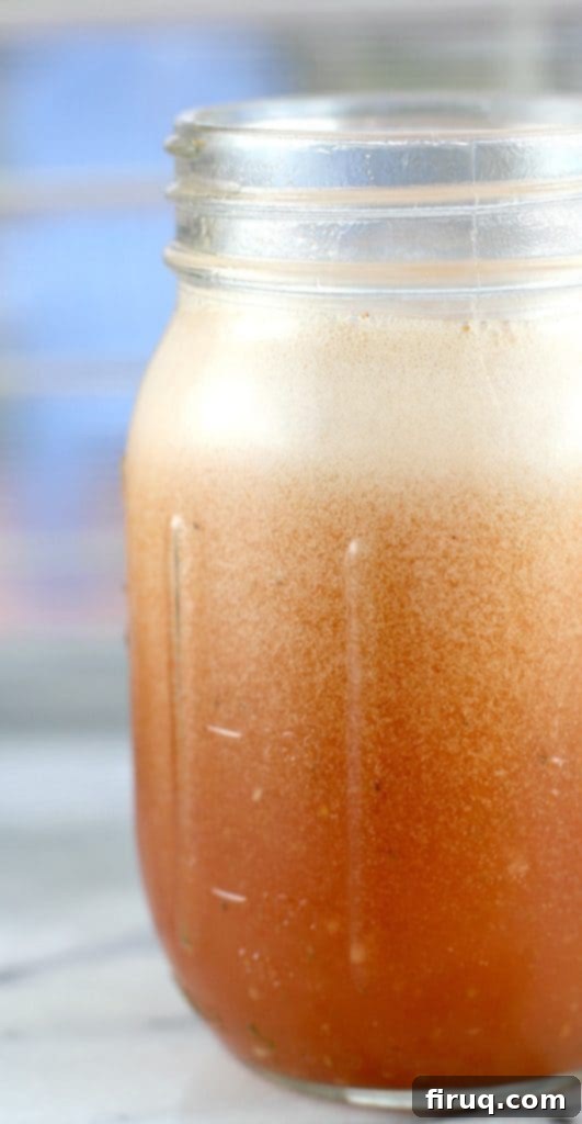 Royal Red Michelada 5 English Bloody Michelada served in a glass with celery and cucumber garnish