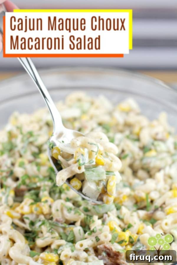 Spicy Cajun Maque Choux Macaroni Salad 4 Cajun Maque Choux Macaroni Salad served in a bowl, showcasing its vibrant colors and textures. Perfect for potlucks and summer BBQs.