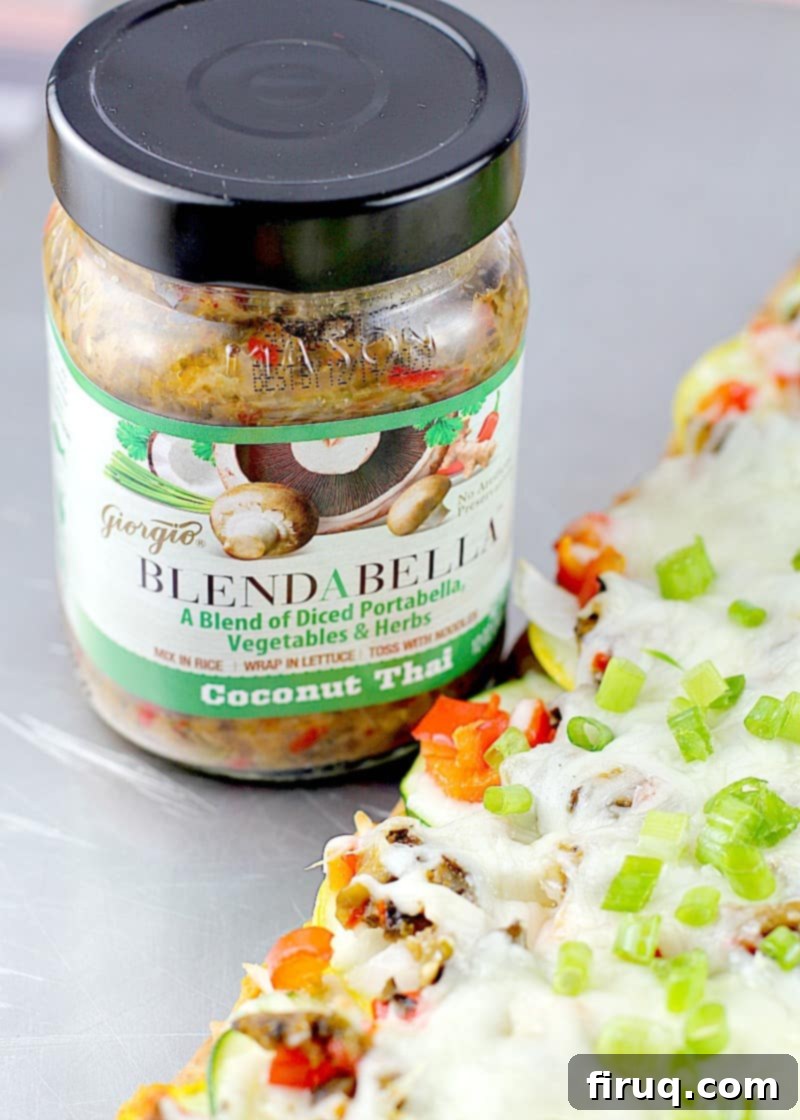 Siam Spice Veggie Flatbread 6 Adding diced red bell pepper and BLENDABELLA mushroom blend to the flatbread