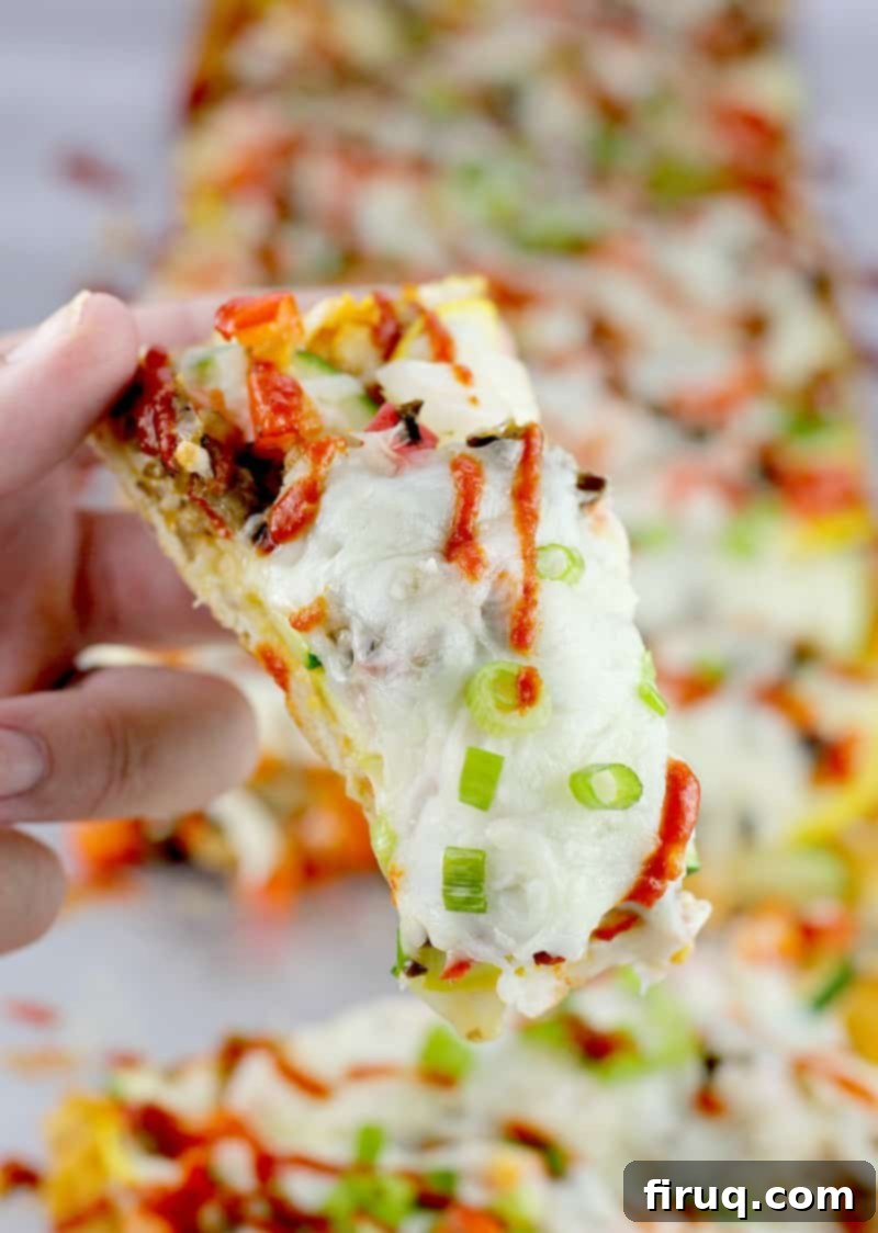 Siam Spice Veggie Flatbread 7 Flatbread with all toppings ready to be baked in the oven