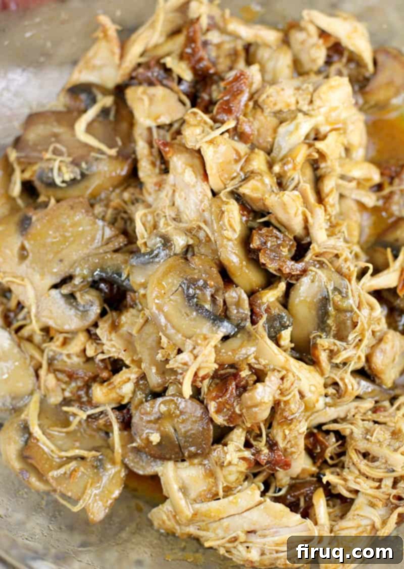 Ultimate Instant Pot Chicken Tacos 3 Close-up of shredded Instant Pot Chicken Tacos filling