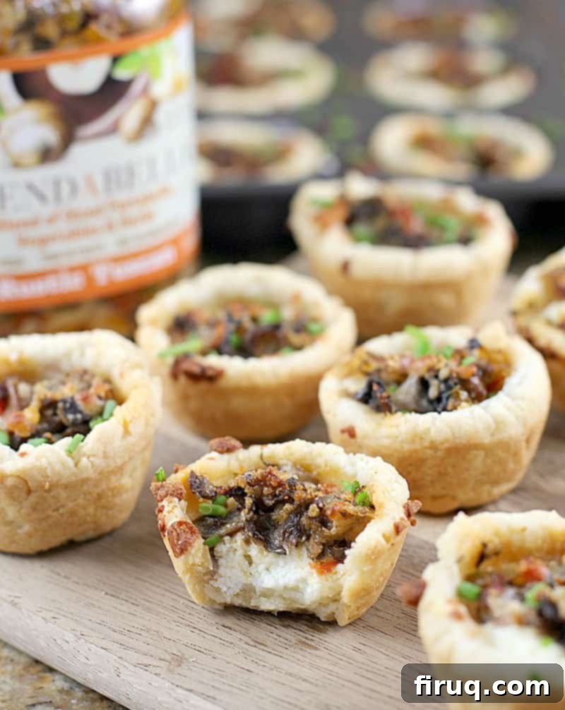 Savory Tuscan Mushroom Ricotta Tartlets 2 Close-up of baked Tuscan Mushroom Ricotta Mini Tarts with a buttery cream cheese crust, lemon ricotta, and rich mushroom topping