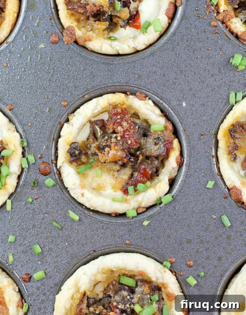 Savory Tuscan Mushroom Ricotta Tartlets 6 Close-up of lemon ricotta filling being piped into the mini tart crusts