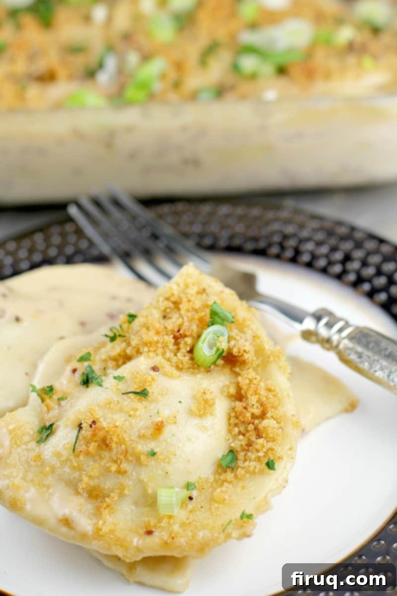 Beer-Braised Sausage and Cheesy Pierogi Casserole 2 Cheesy Beer and Sausage Pierogi Bake