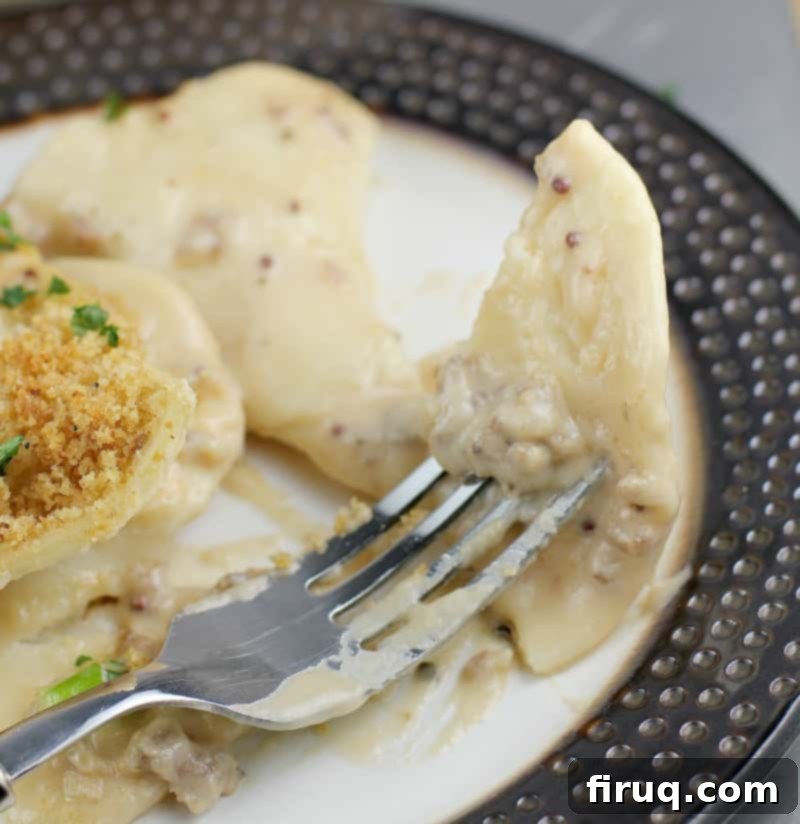 Beer-Braised Sausage and Cheesy Pierogi Casserole 3 Cheesy Beer and Sausage Pierogi Bake