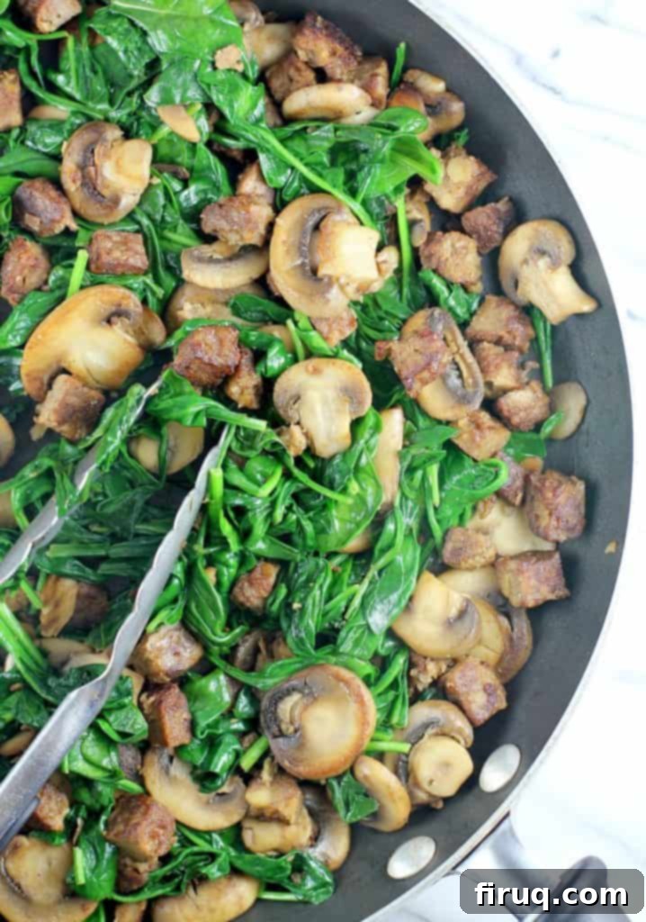 Plant-Powered Omelet with Savory Sausage, Spinach, and Mushrooms 7 sauteed mushrooms and sausage with spinach added