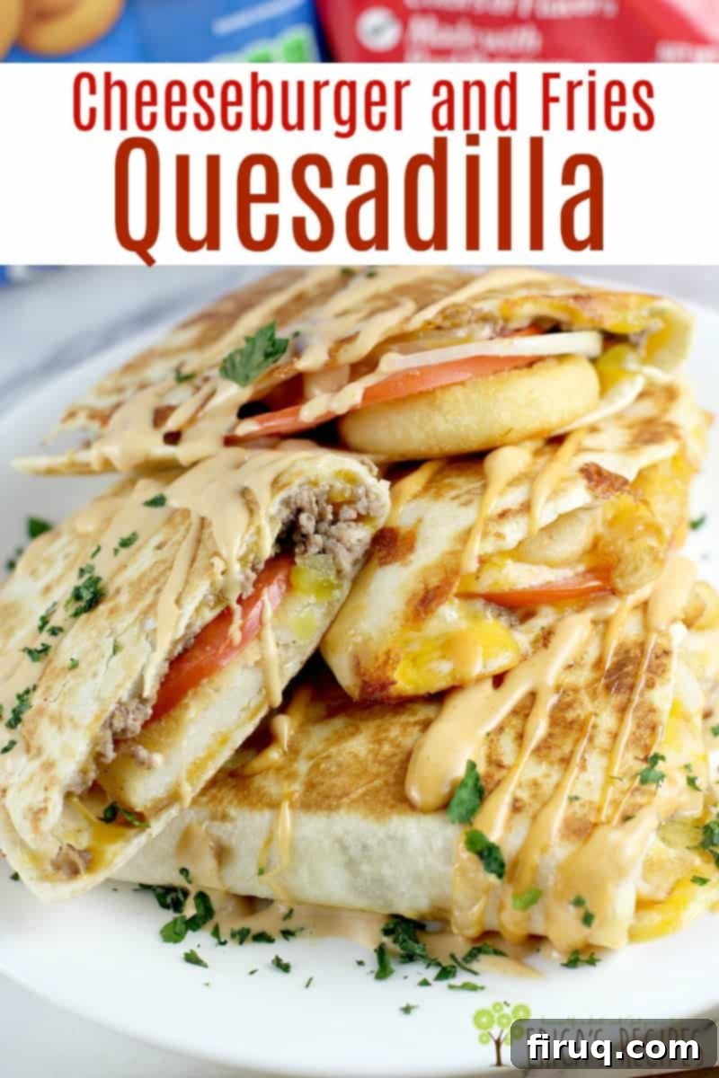 Loaded Burger Fry Quesadilla 14 Cheeseburger and Fries Quesadilla! Ground beef, pickle, onion, tomato, french fries and plenty of cheese served in a toasty quesadilla tortilla and finished with homemade burger sauce. #MyMcCainPotatoes #Ad #McCainPotatoes #burger #recipe #frenchfries #quesadilla #funfood #footballfood #partyideas