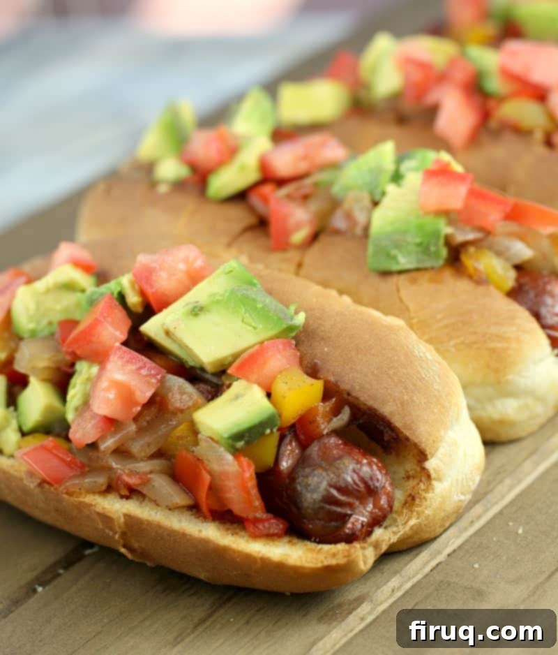 Air Fryer Hot Dogs: Crispy Perfection with Sweet Pepper Relish 3 row of hot dogs with toppings on a wood board