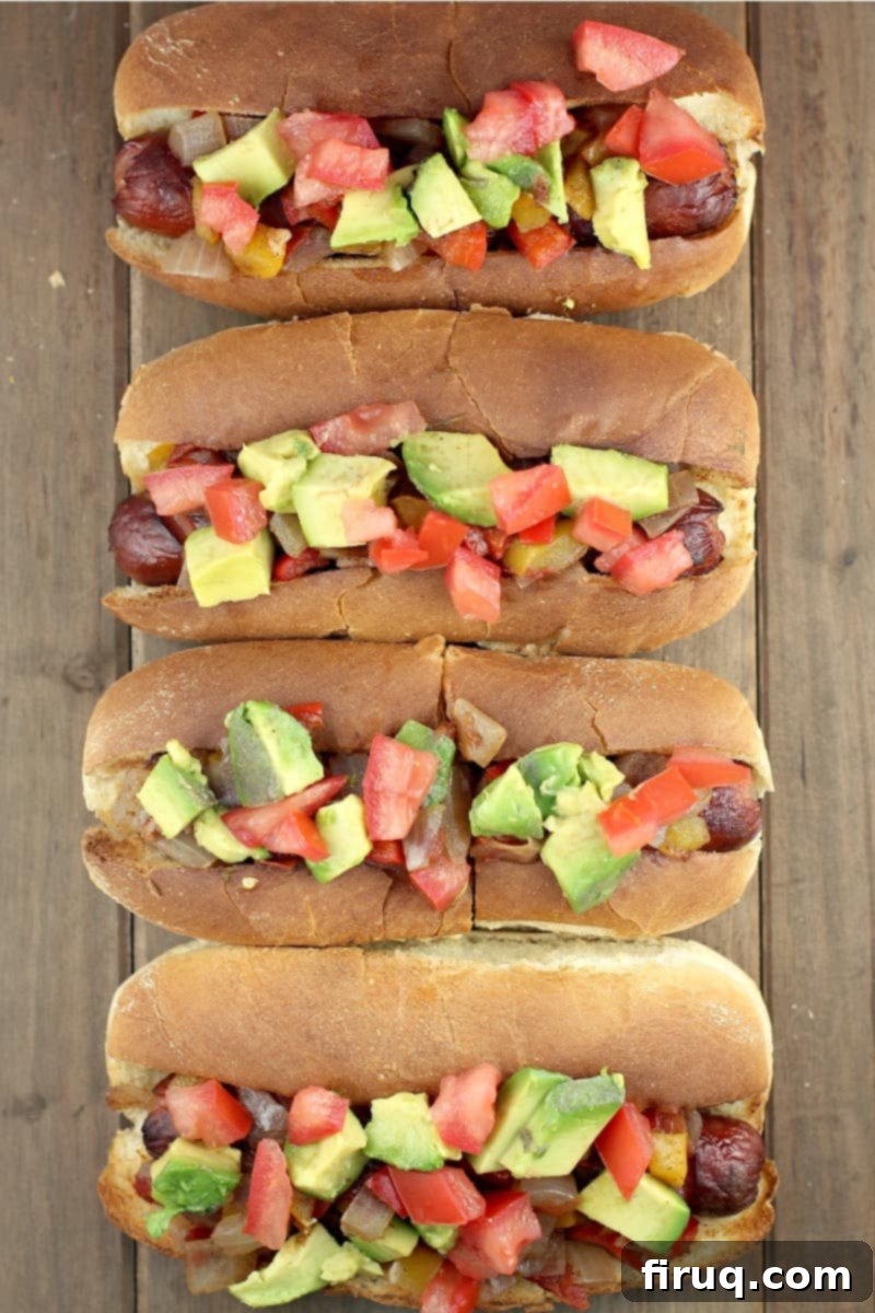 Air Fryer Hot Dogs: Crispy Perfection with Sweet Pepper Relish 9 top down view of 4 hot dogs in buns