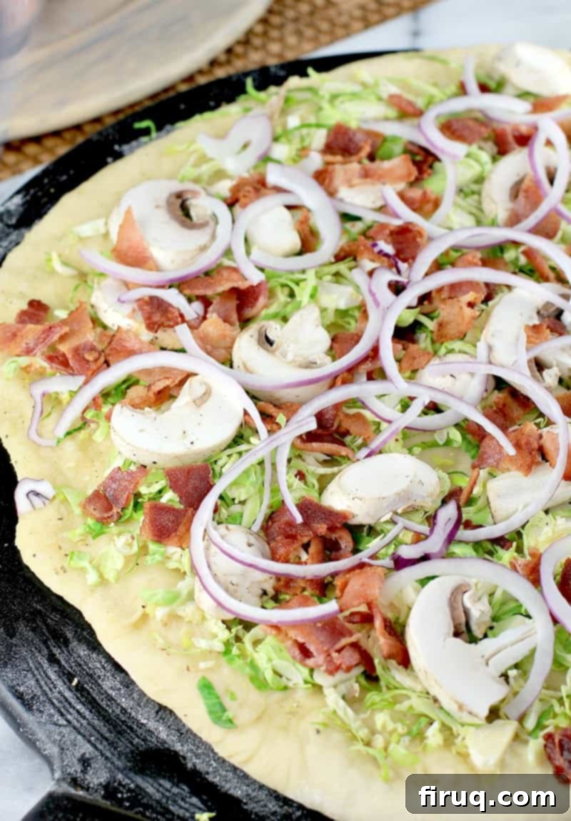 Crispy Bacon & Roasted Brussels Pizza 4 raw toppings layered on pizza dough