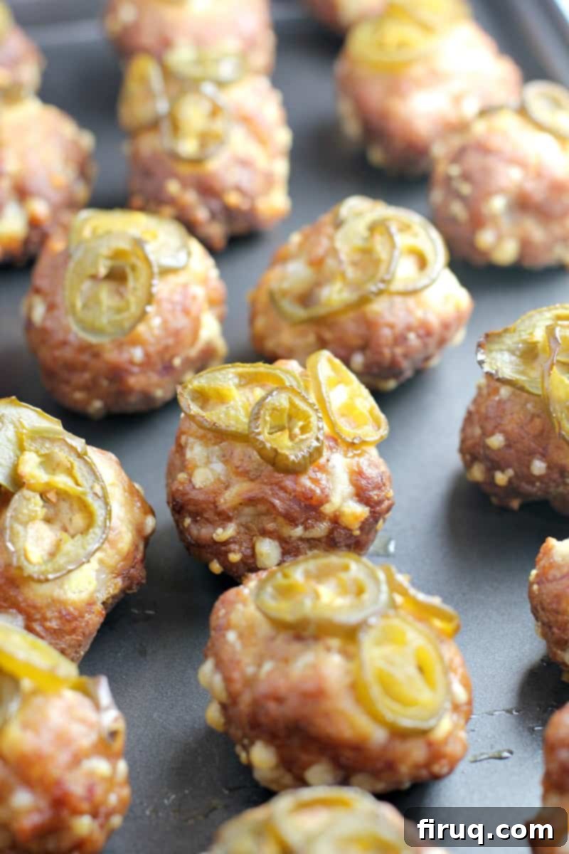 Smoky Sausage Bites 9 smoked meatballs on metal sheet