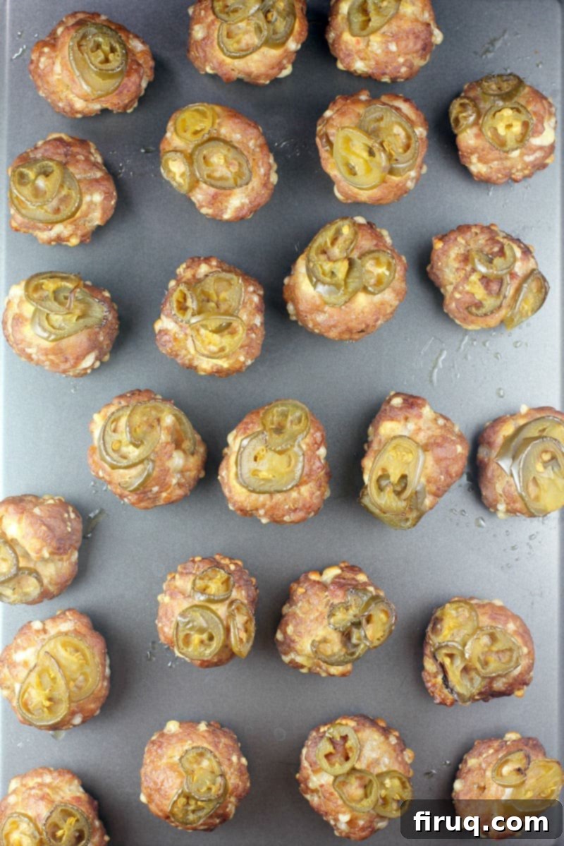 Smoky Sausage Bites 10 top down view of a bake sheet with sausage balls