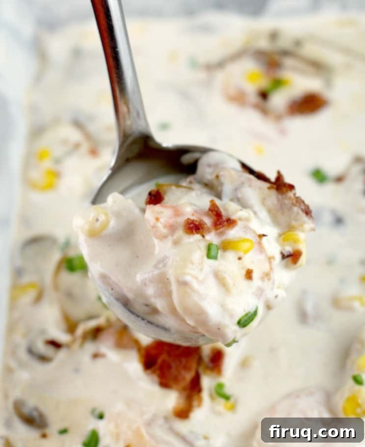 Cheddar Bay Bacon Biscuits Smothered in Shrimp Gravy 7 ladle filled with bacon, corn, and shrimp in cream gravy