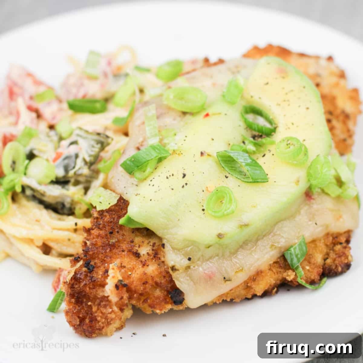 Baja Chicken Parmesan 14 Mexican chicken parmesan portion on white plate