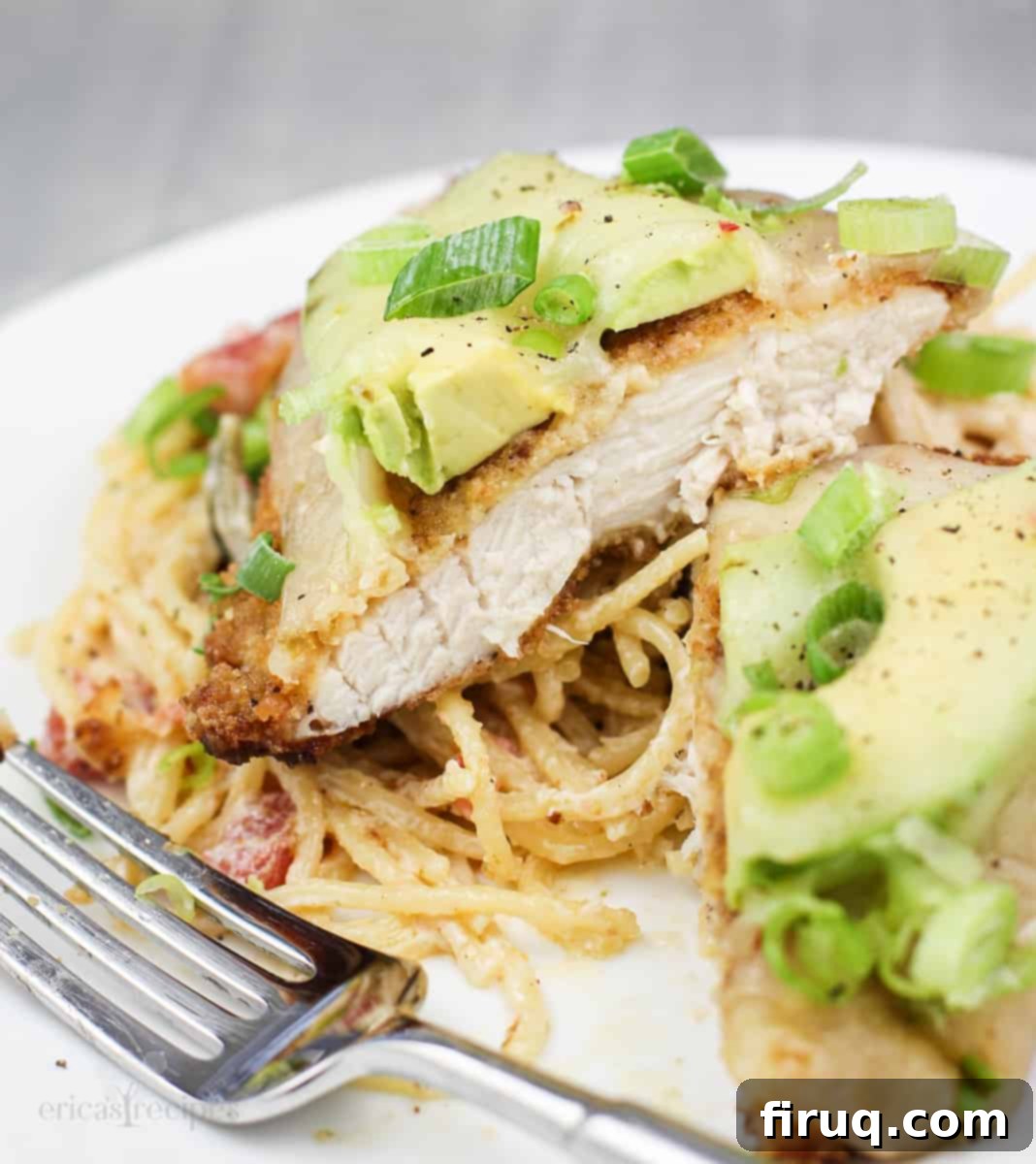 Baja Chicken Parmesan 3 prepared recipe on plate, chicken cut to show doneness