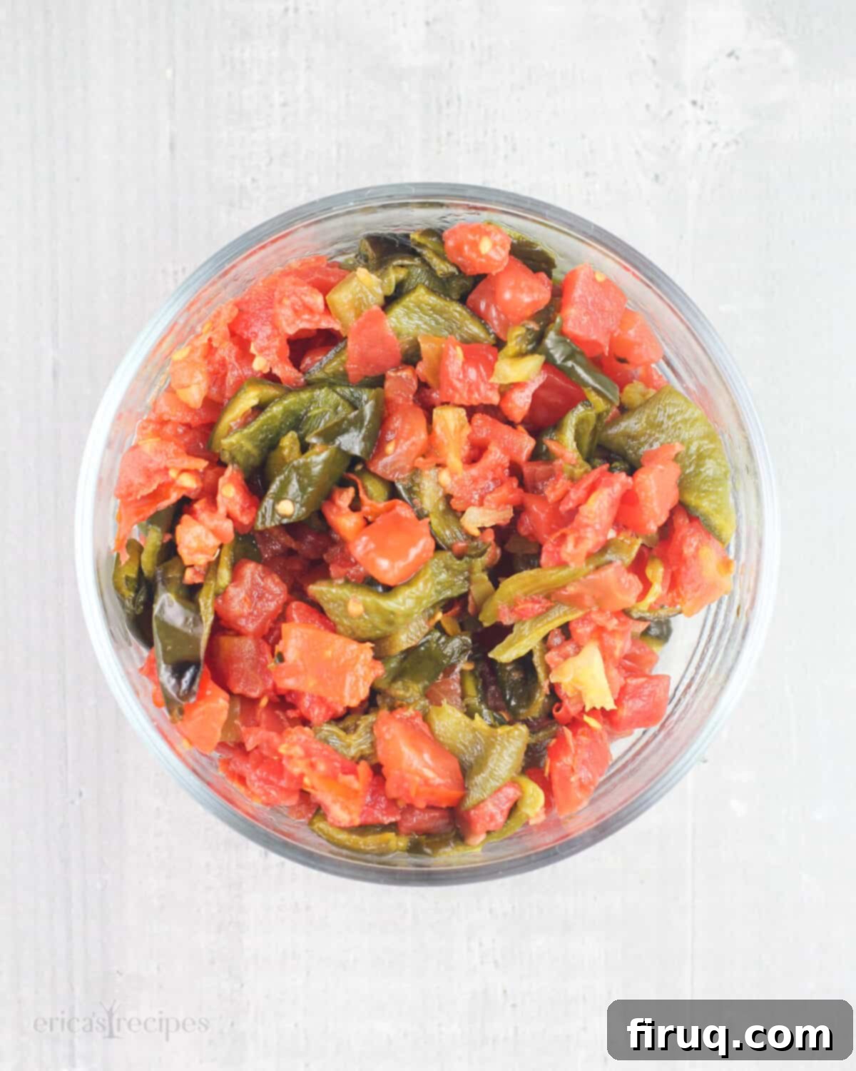Baja Chicken Parmesan 9 chopped tomatoes, green chiles, and poblano pepper in glass dish