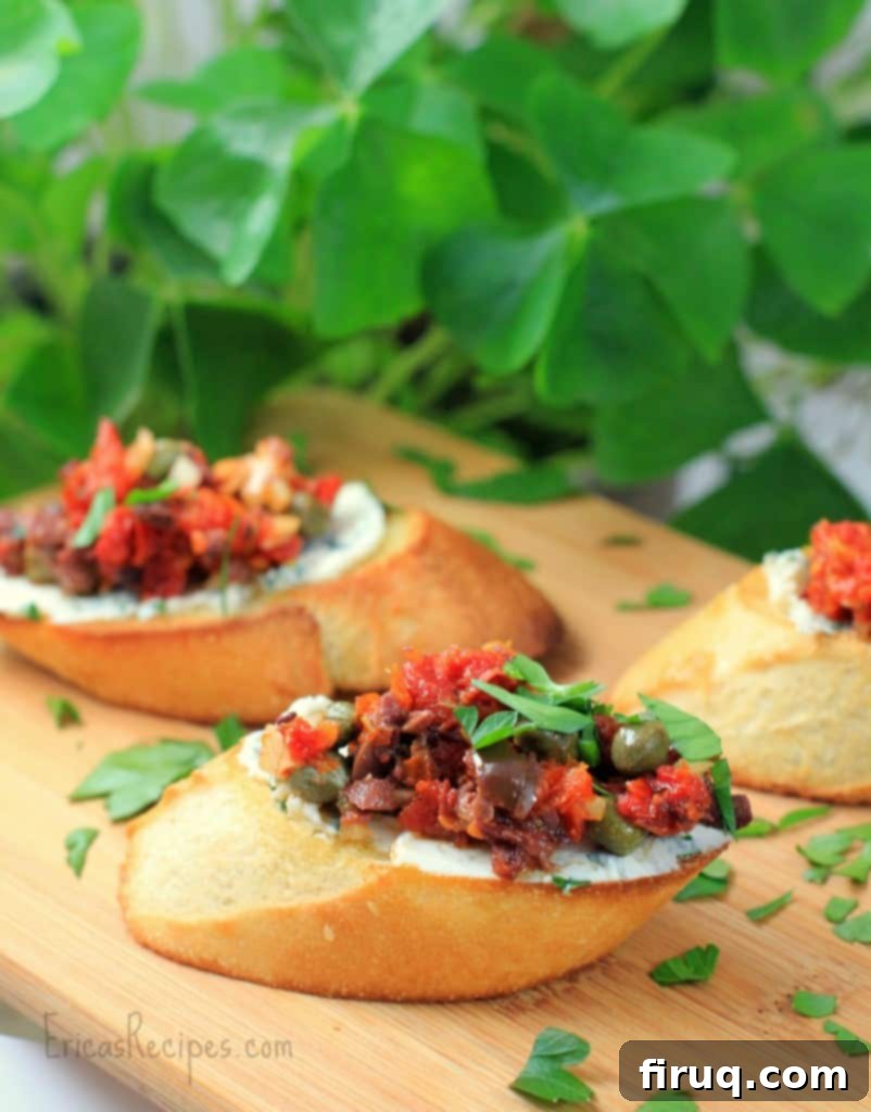 Sun-Kissed Tomato Tapenade and Herbed Goat Cheese Crostini 3 Crostini with Sun-Dried Tomato Tapenade and Herbed Goat Cheese