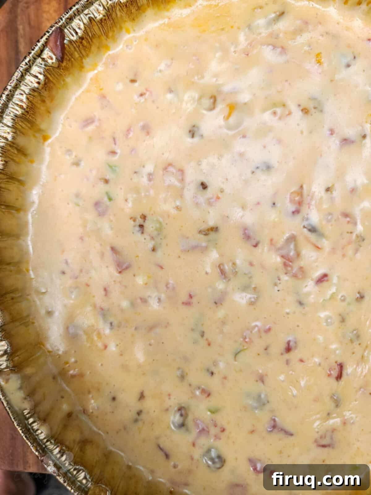 Velvet Smoked Queso 4 top down view into aluminum tin with prepared queso
