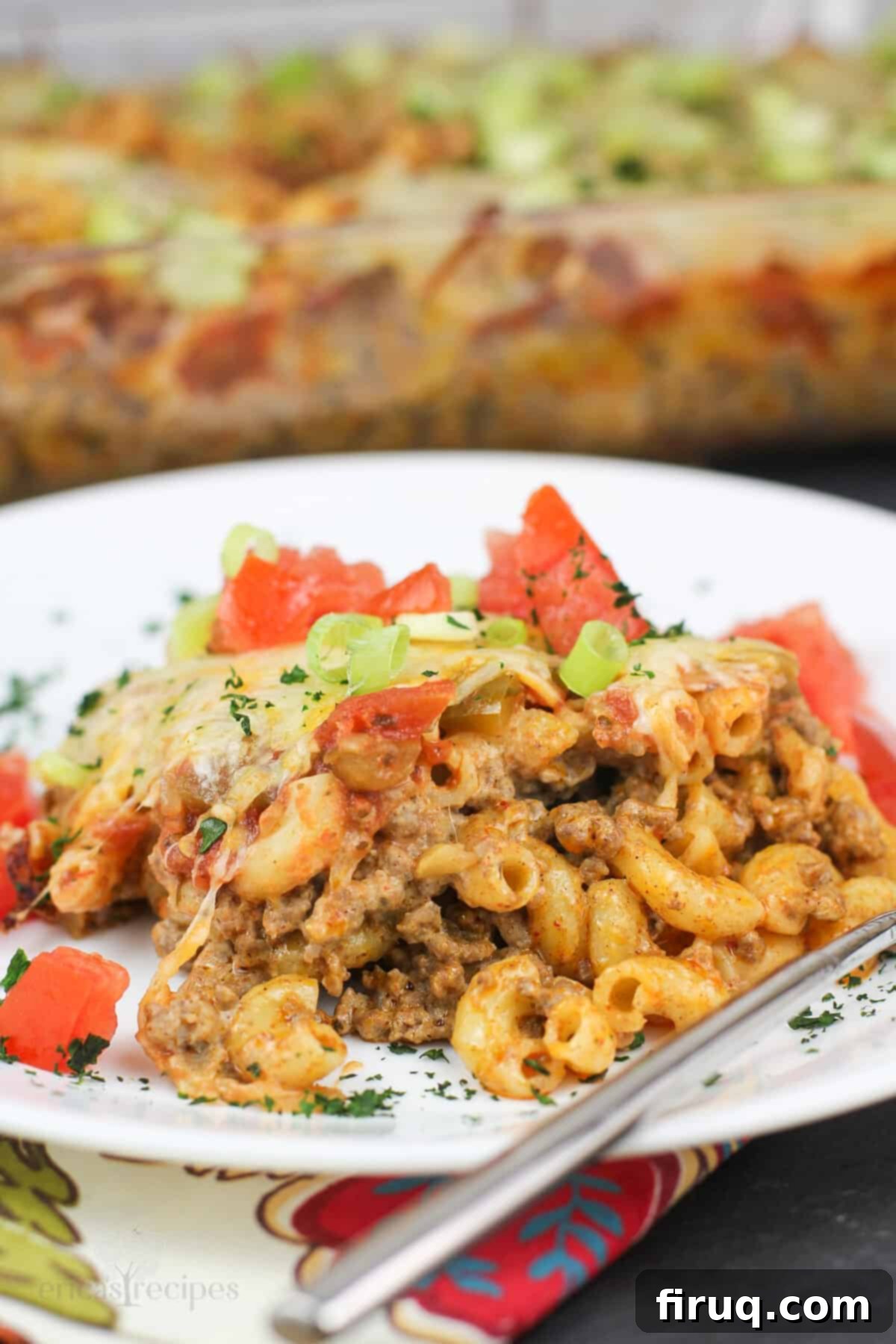 Southwest Mac & Beef Casserole 2 serving of taco bake on white dish
