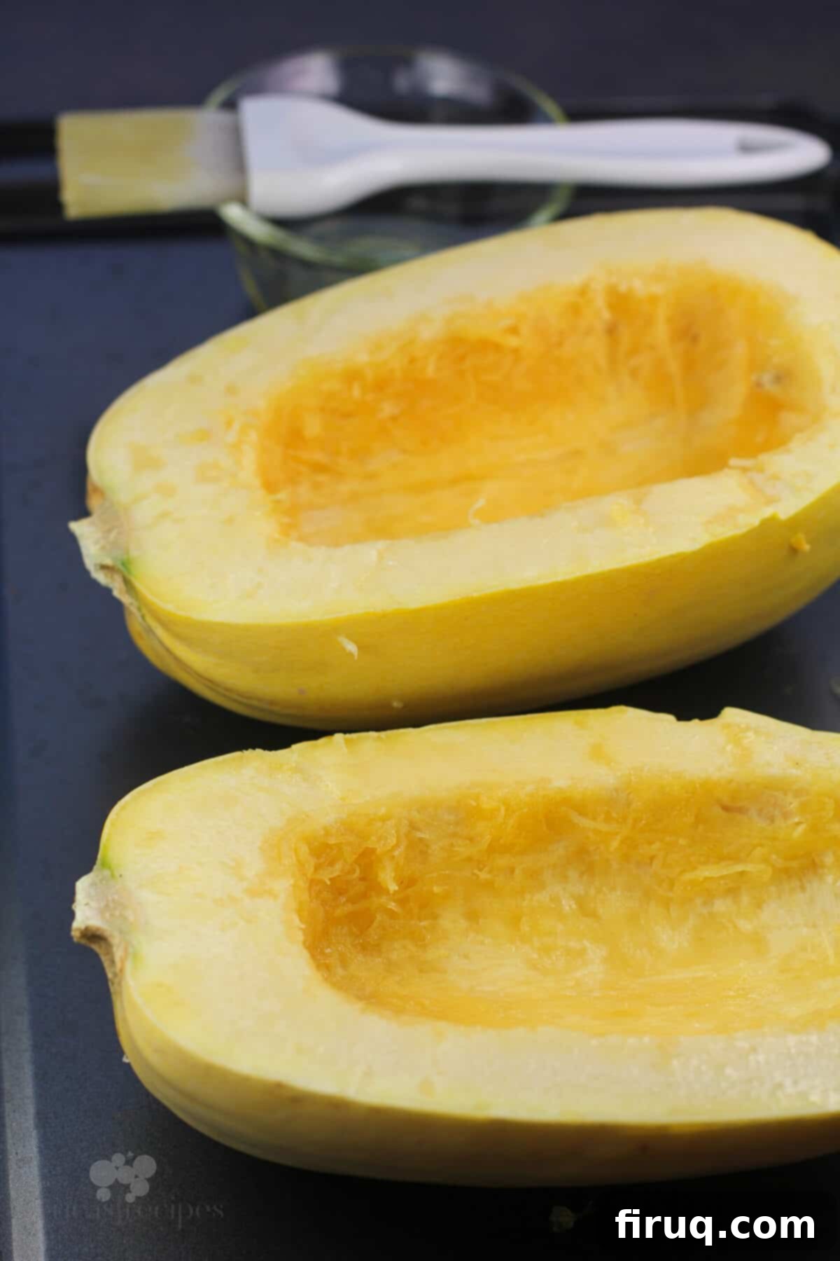 Zesty Chicken Pizzaiola Atop Spaghetti Squash Strands 6 cut spaghetti squash halves on metal bake sheet