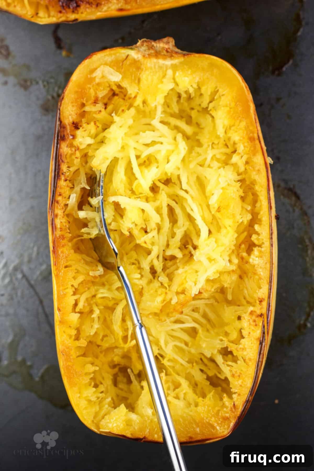 Zesty Chicken Pizzaiola Atop Spaghetti Squash Strands 7 fork in cooked spaghetti squash