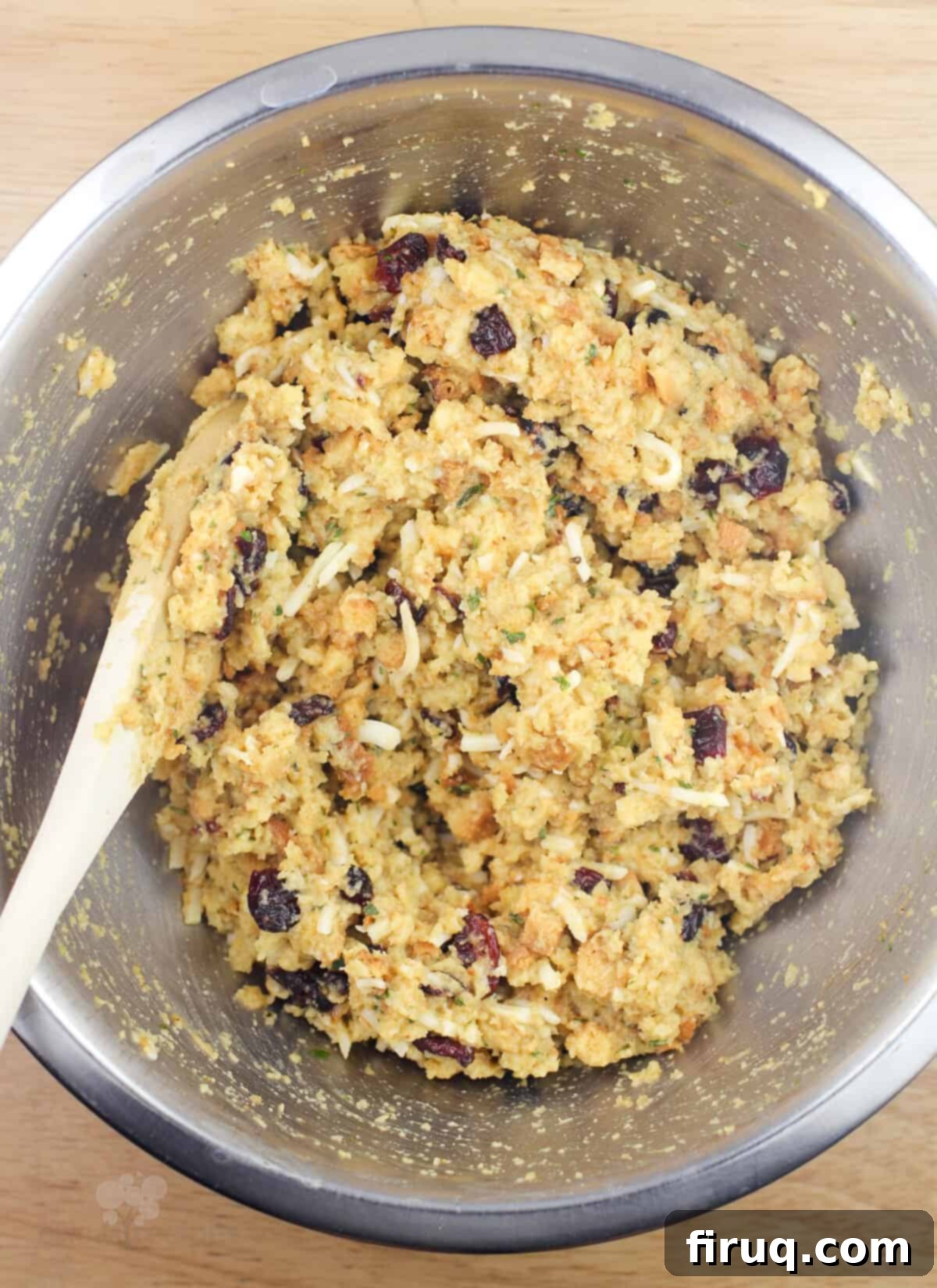 Crispy Bacon Stuffing Bites 4 stuffing mixture in a metal bowl with a wooden spoon