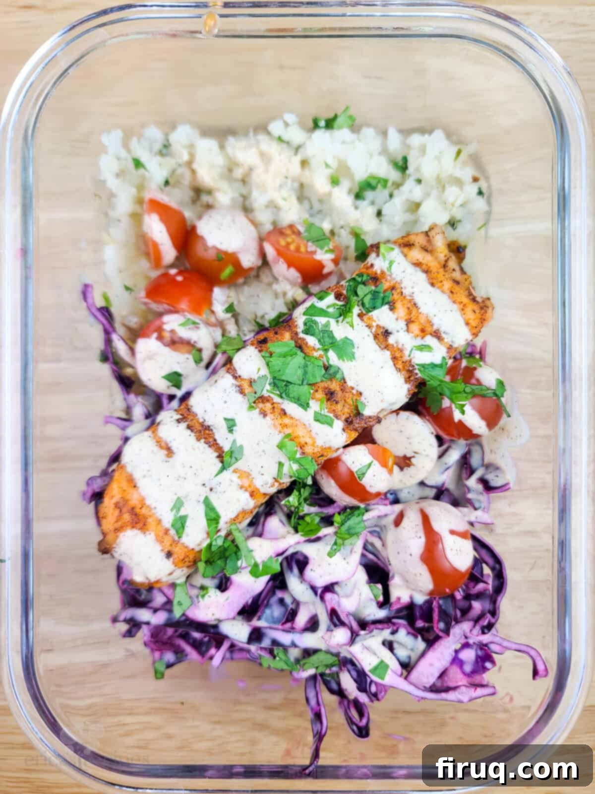 Spicy Chipotle Salmon and Cauliflower Rice Meal Prep 3 prepared salmon with veggies in glass dish