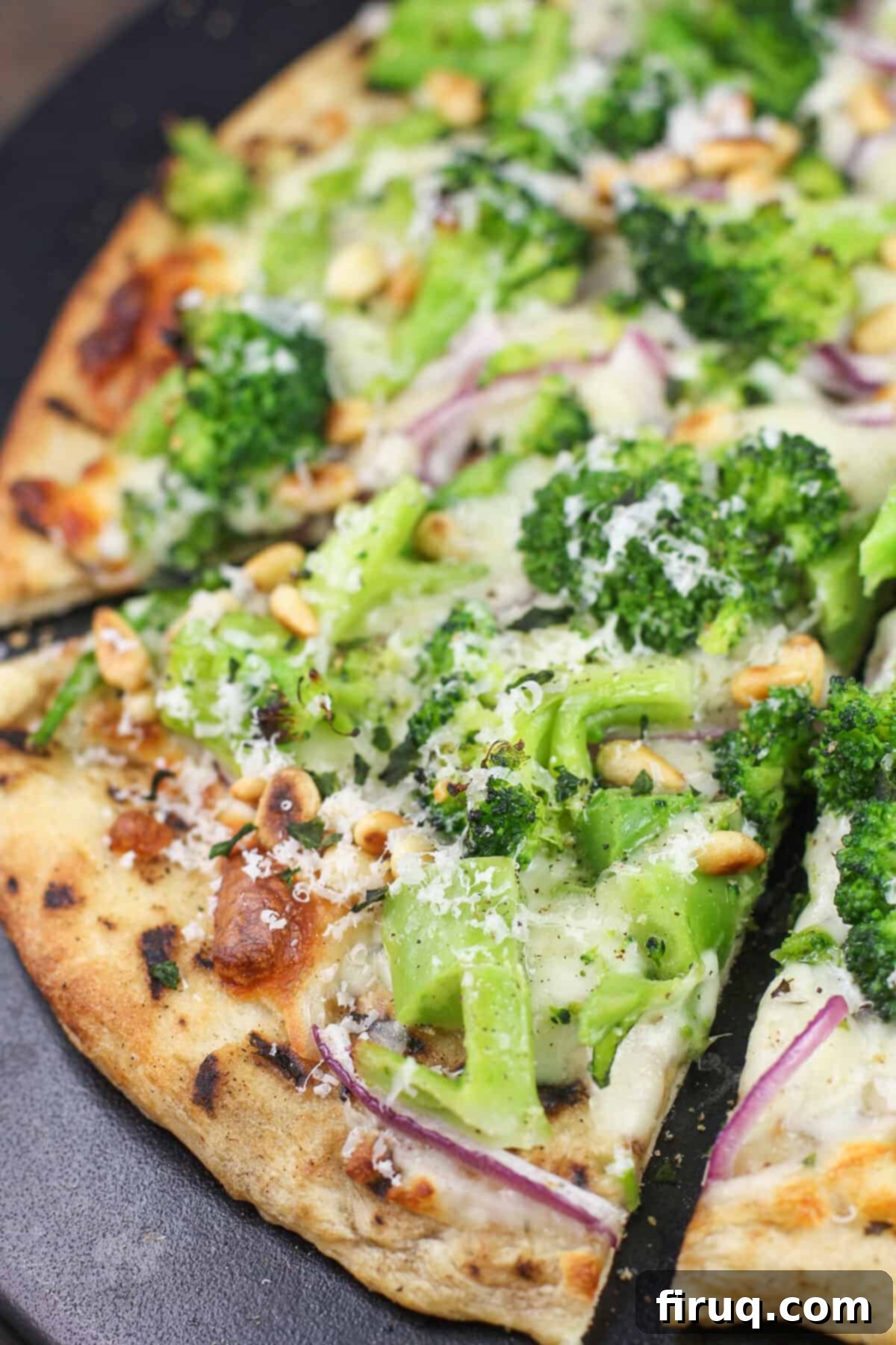 Creamy Broccoli Pizza 2 prepared broccoli pizza on black stone