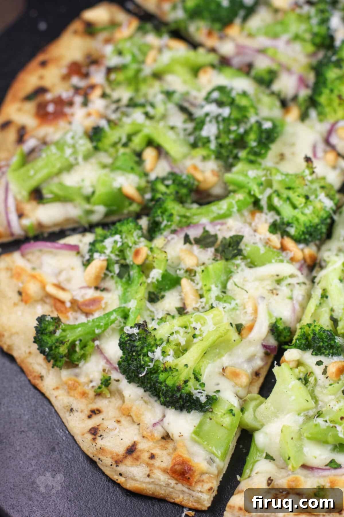 Creamy Broccoli Pizza 4 prepared broccoli pizza on black stone