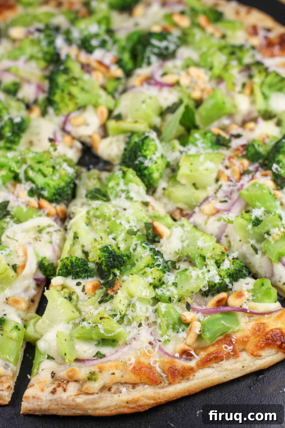 Creamy Broccoli Pizza 10 prepared broccoli pizza on black stone